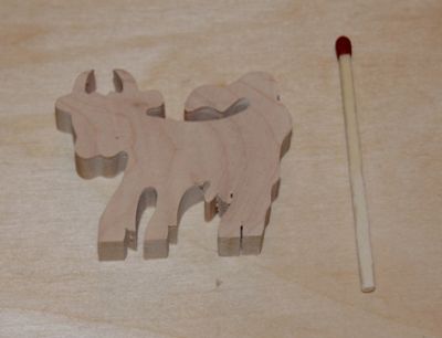 Miniatura di mucca in legno da decorare