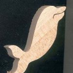 Miniatura di delfino 3,5 x 3,7 cm in legno, fatta a mano