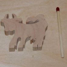 Miniatura di mucca in legno da decorare